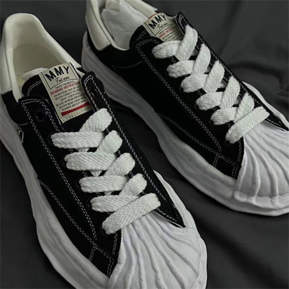 Maison Mihara Yasuhiro black and white patchwork sneakers